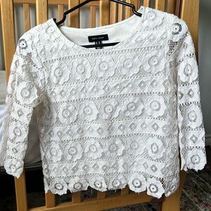 Half sleeve white blouse with floral detail